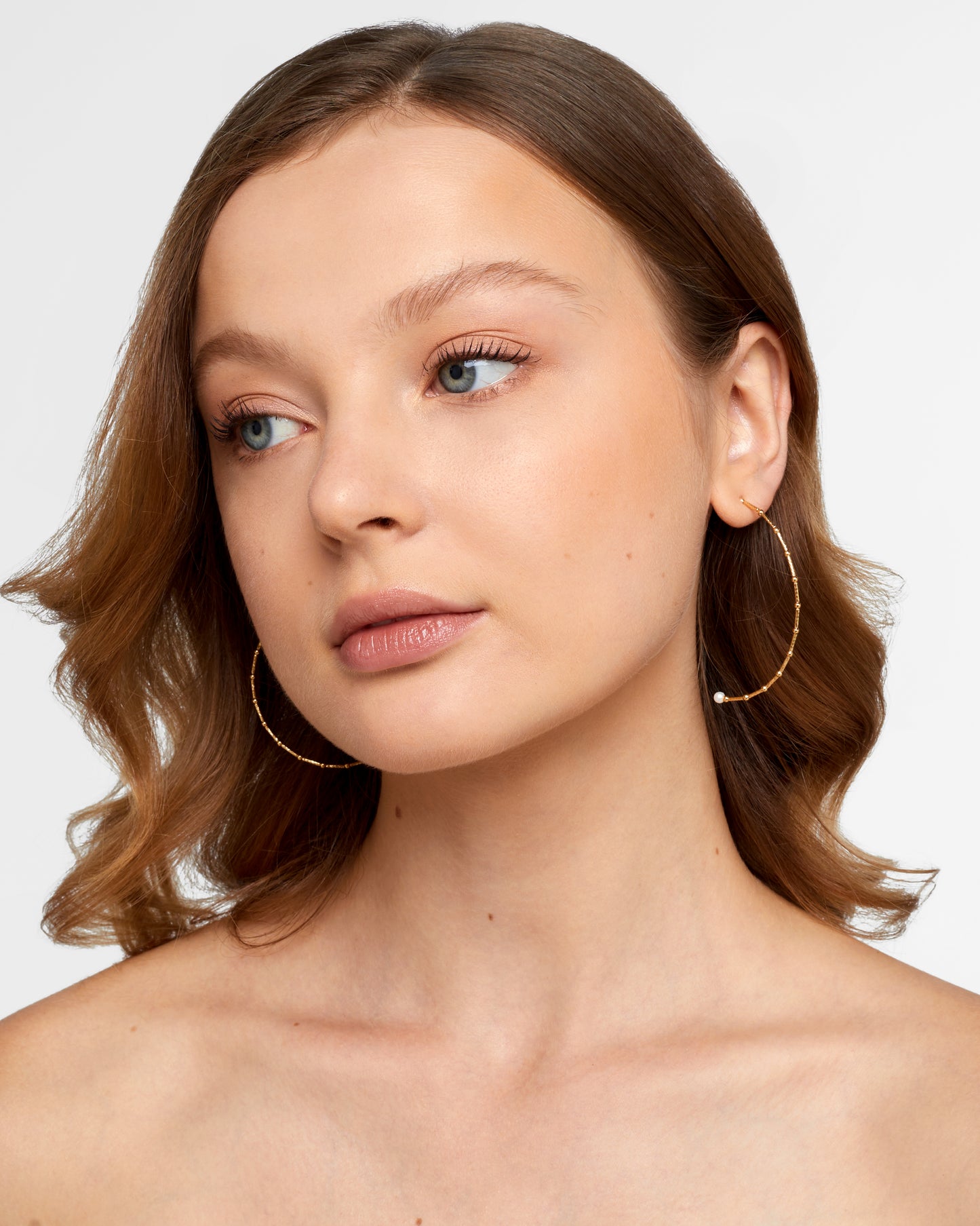 
                  
                    Sakura Gold Prism Small Pearl Hoops
                  
                