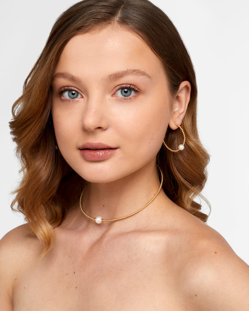 
                  
                    Bolina Center Pearl Large Bead Hoops
                  
                