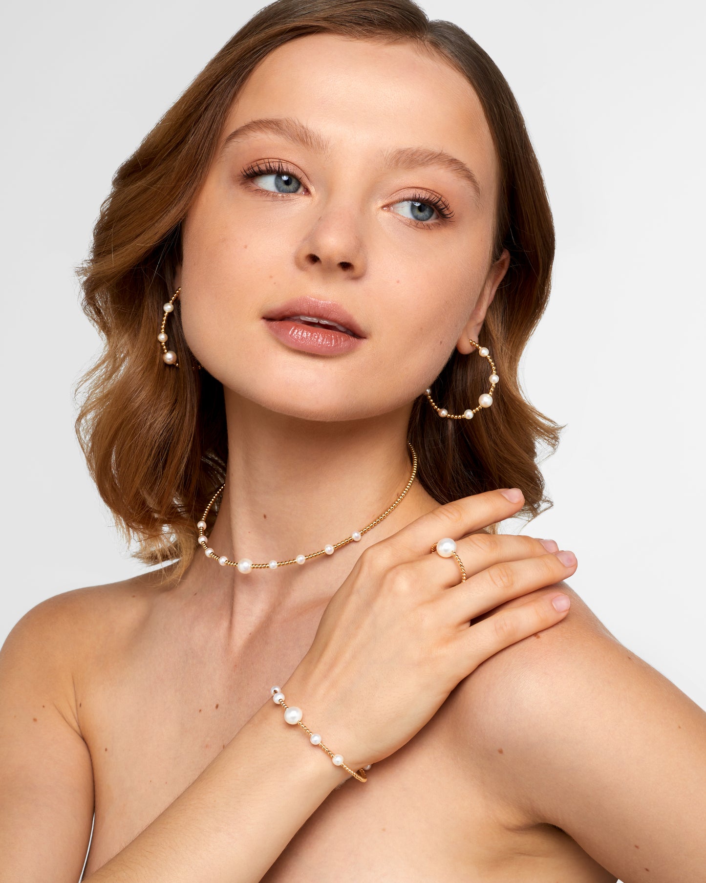 
                  
                    Doris Multi Pearl Large Bead Hoops
                  
                