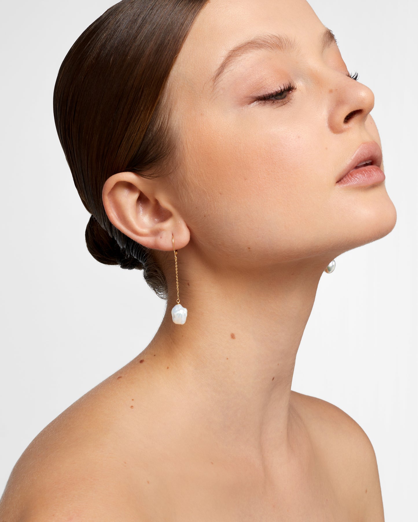 
                  
                    Fiji Baroque Pearl Dangle Earrings
                  
                