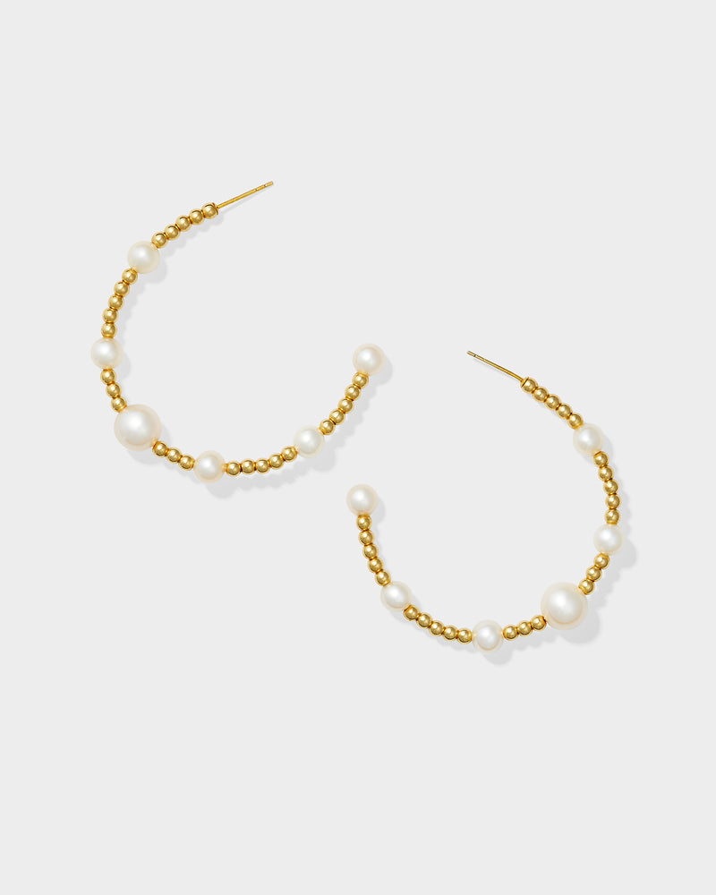 
                  
                    Doris Multi Pearl Large Bead Hoops
                  
                